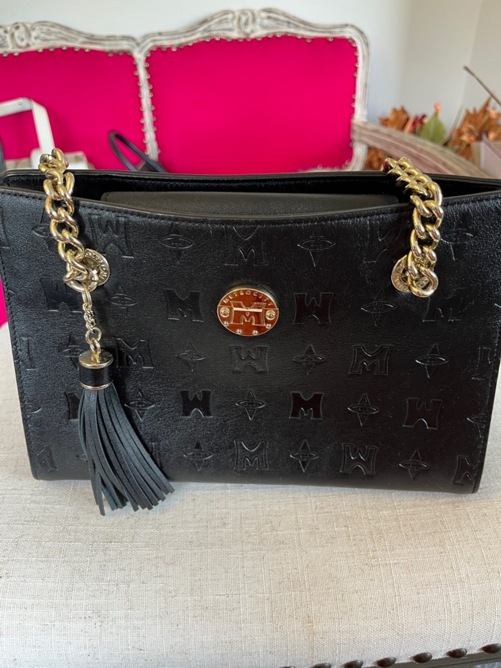 Black Embossed MetroCity Leather Tote with Gold Chain and Tassel